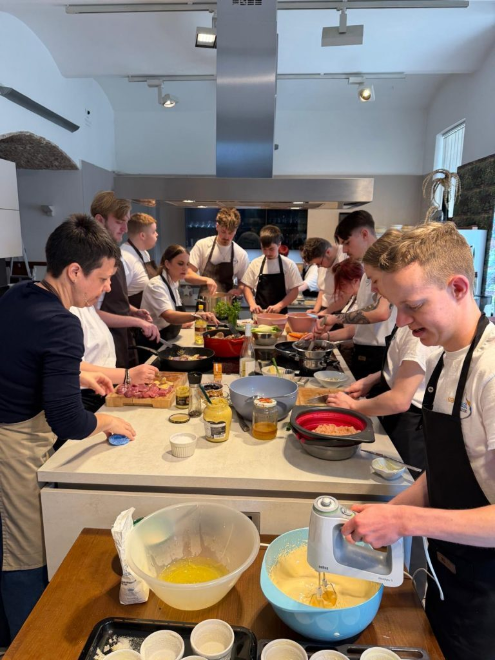 Hospitality and Catering students undertaking a culinary masterclass in Budapest East Coast College 768x1024