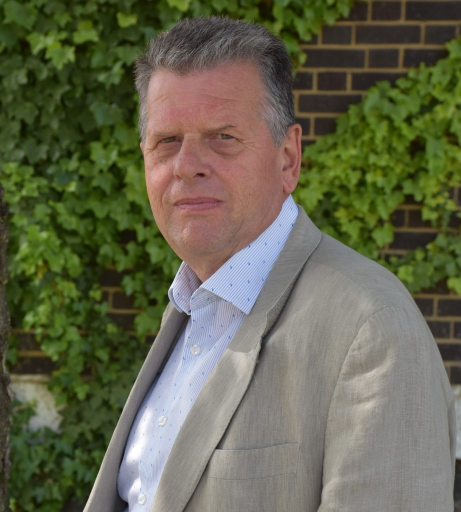 2 Alan Debenahm who has retired from his governor role at East Coast College 922x1024